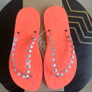 Christian Louboutin Donna Spike Thong Flats in Orange